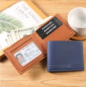 Detailed view of bifold wallets with lychee texture featuring card slots and clear ID window