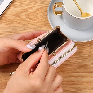 Pink lychee leather mini wallet with gold kiss-lock and zipper for coins and cards