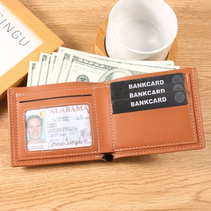 Light brown lychee grain faux leather bifold wallet for men with card slots on wood