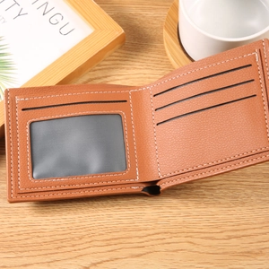 Brown litchi texture bifold men's wallet with white stitching and card slots