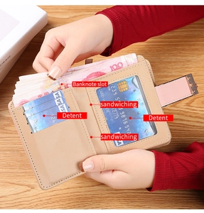 Detail view of pink foldable wallet showing banknote slot, card holders and interior structure