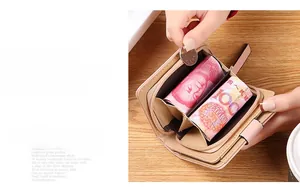 Pink short wallet showing inner slots for six cards, cash compartment, and coin pocket