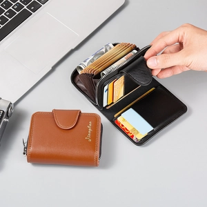 Detail view of leather wallet interior with organ style multi-card slots and ID window