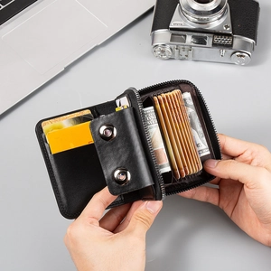 Men's black leather accordion wallet with multiple card slots and secure snap closure