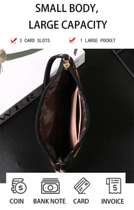 Detail view of the black retro wallet featuring strawberry print with 3 card slots and pocket