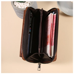 Detailed view of brown leather business clutch with large capacity and multi-card slots