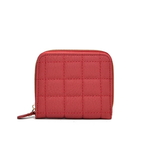 Minimalist red short wallet for women featuring quilted stitching and golden zipper closure