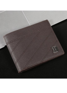 Close-up of brown textured leather wallet featuring a metal B logo and diagonal stitching