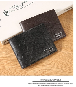 Detailed view of lychee grain leather wallets in black and brown with V-stitch design