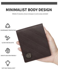 Detail of dark brown leather wallet with twill embossing and shield logo branding