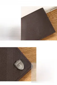 Macro view of men's leather wallet with lychee texture and reinforced stitching details