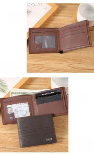 Detail view of leather men's bifold wallet with multiple card slots and ID window