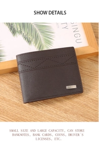 Detail of dark brown men's bifold wallet with decorative stitching and card slots on wood
