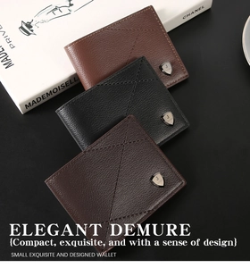 Detailed view of men's leather bifold wallets with cross-stitching and metal shield logo