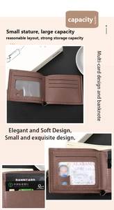 Close-up of brown men's wallet showing multiple card slots and transparent ID window