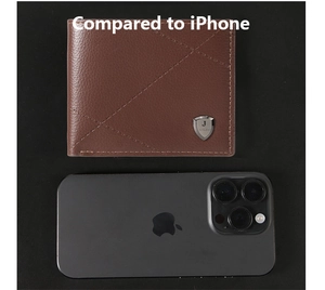 Brown leather wallet size comparison next to a smartphone showing slim bi-fold design