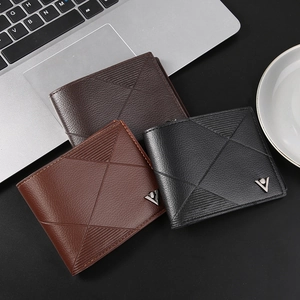 Men's bifold wallets in litchi grain leather featuring geometric embossed lines and metal V logo