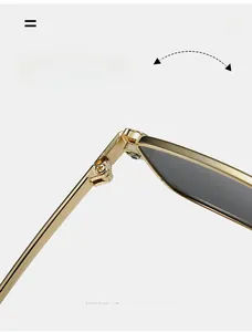 Detailed macro view of durable golden metal reinforced hinge for square retro sunglasses