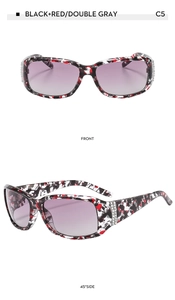Détail des montures fleuries et charnières en strass sur lunettes de soleil dégradées