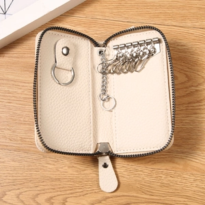 Elegant cream PU leather key case with full zipper closure and six silver metal hooks