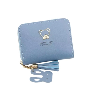 Short light blue women's purse with cartoon bear logo, tassel and rabbit charm
