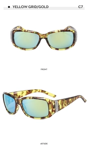Détail de lunettes de soleil ovales à carreaux jaunes avec verres dorés et strass