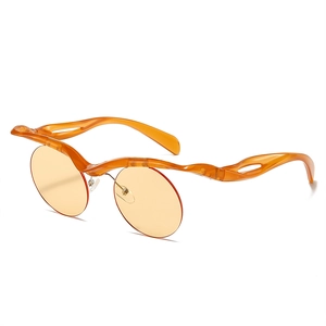 Fashionable amber semi-rimless sunglasses with wavy frames and round yellow lenses