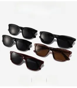 Stacked variety of vintage polarized sunglasses in black, tortoise, and dark red frames