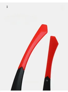 Macro detail of ergonomic black and red dual-color curved glasses temples in matte finish