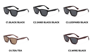 Five assorted polarized sports sunglasses in black, tortoiseshell, and amber frames