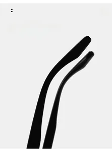 Macro view of curved ergonomic temples on black polarized TR large frame sunglasses