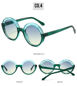 Three views of round green translucent sunglasses with hammer-textured frame and gradient lenses