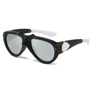 Retro butterfly cat eye sunglasses with thick black frames and silver mirrored lenses