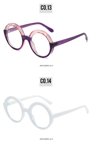 Detailed 45-degree view of retro round sunglasses in purple-pink and white frames