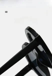 Detailed macro view of black sunglasses frame with high-quality elastic texture