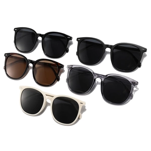 Five pairs of oval TR90 polarized sunglasses in assorted colors with metal stud accents