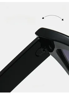 Macro view of durable metal hinges on black cat-eye sunglasses with smooth finish