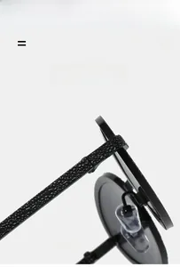 Macro detail of oval sunglasses frame featuring textured glitter temples and soft nose pads