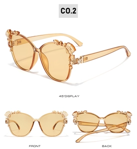 Detailed views of amber cat eye sunglasses with crystal embellishments and retro frame
