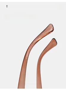 Detail of curved tortoise shell glasses temples made of transparent acetate material