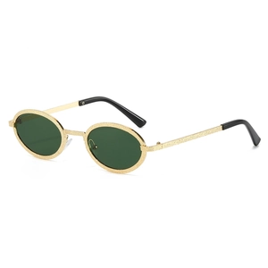 Retro oval sunglasses with embossed gold metal frames and textured starburst finish