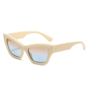 Fashionable cat-eye sunglasses with cream frames and orange to blue gradient lenses