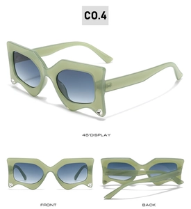 Detailed views of light green irregular star-shaped sunglasses with micro-rhinestones