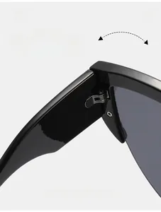 Detail of durable reinforced metal hinge on black outdoor sports cycling sunglasses