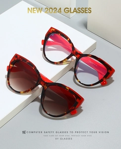 Detail view of cat eye sunglasses showing red tortoiseshell frame and 13149 model specs