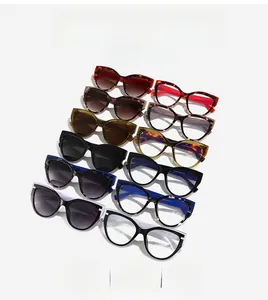 Collection of stylish cat-eye sunglasses and glasses in diverse color frames on white