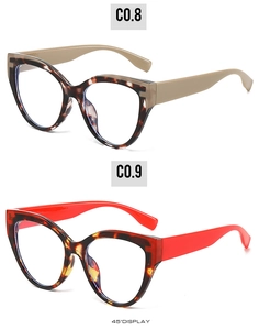 45-degree angle display of tortoise shell cat eye sunglasses with beige and red temples
