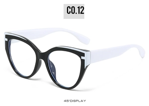 Detail view of retro cat-eye sunglasses with contrasting black and white frame design
