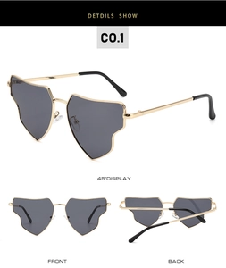 Detailansichten der goldenen Herz-Sonnenbrille mit grauen Gläsern und Metallrahmen