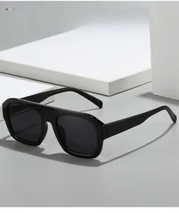 Detailed side view of thick black square sunglasses frame and premium texture finish